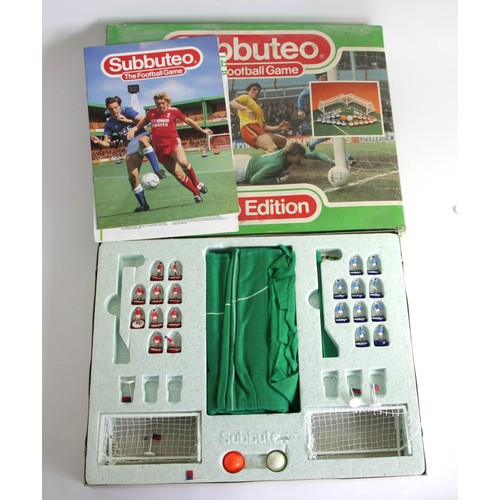 216 - Subbuteo table soccer, boxed (missing one red player and base for one goalkeeper, together with two ... 