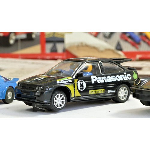 218 - A mini Rallycross Scalextric set, with track, scenery and cars, together with six Scalextric cars, t... 