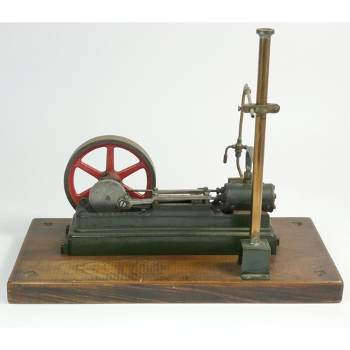 222 - A Stuart static steam engine, mounted on a wooden base, 30.5cm x 15cm