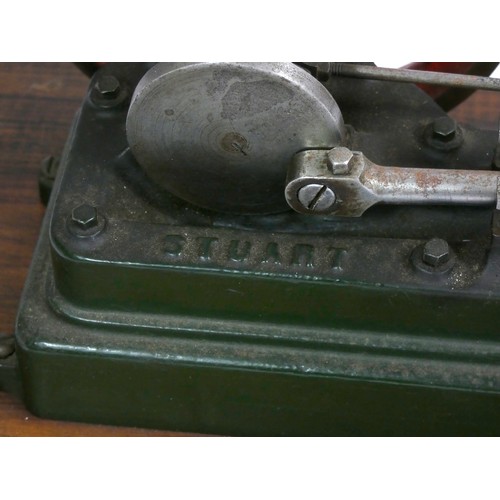 222 - A Stuart static steam engine, mounted on a wooden base, 30.5cm x 15cm