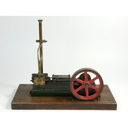 222 - A Stuart static steam engine, mounted on a wooden base, 30.5cm x 15cm