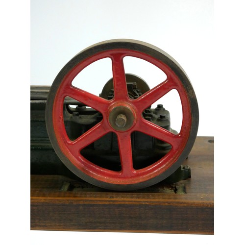 222 - A Stuart static steam engine, mounted on a wooden base, 30.5cm x 15cm