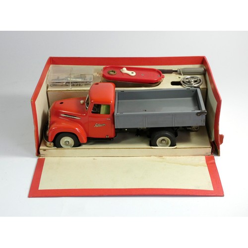 223 - Schuco Model remote control truck, Kipper 6065, with steering wheel, battery compartment, tools and ... 