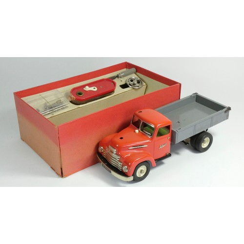 223 - Schuco Model remote control truck, Kipper 6065, with steering wheel, battery compartment, tools and ... 