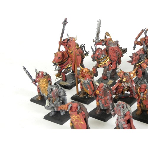 230 - A collection of thirty one Games Workshop miniatures, painted, including cavalry, infantry and zombi... 