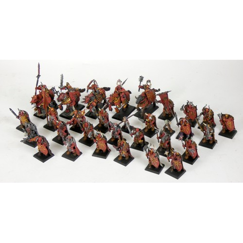 230 - A collection of thirty one Games Workshop miniatures, painted, including cavalry, infantry and zombi... 