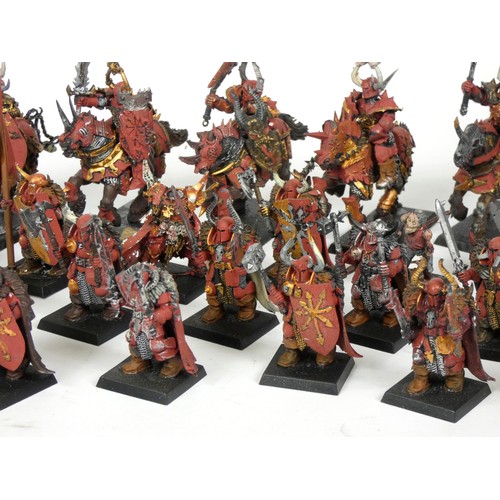 230 - A collection of thirty one Games Workshop miniatures, painted, including cavalry, infantry and zombi... 