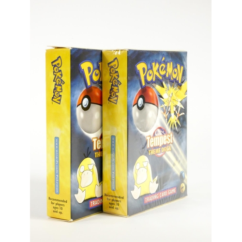 247 - A factory sealed Pokémon Tempest theme deck trading card game, together with another Pokémon Tempest... 