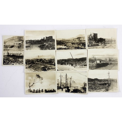 256 - A collection of ten Atomic Bombed Hiroshima and Nagasaki photo cards, 11 x 7.5cm, various photograph... 