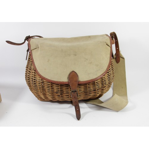 270 - A vintage wicker and canvas creel, 35 x 27 x 23cm