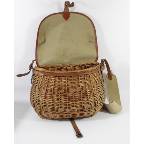 270 - A vintage wicker and canvas creel, 35 x 27 x 23cm