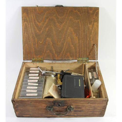 279 - A fly tying vice, various feathers, fly's and books related to fly fishing