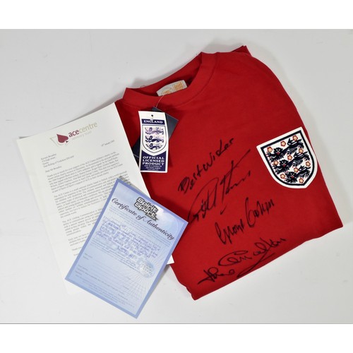 290 - A 1966 World Cup replica red shirt, signed by eight players, Hurst, Cohen, Jack Charlton, Wilson, Pe... 