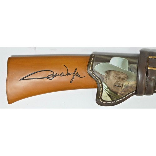 329 - A Bradford Exchange John Wayne, Legends Of The West replica rifle in sheath wall hanging decoration,... 