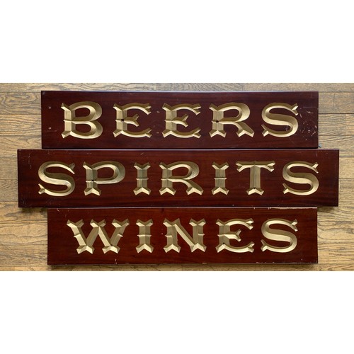 346 - Three mahogany grocer's shop signs, hand carved, gilt decoration, to include Wine, 92cm x 20cm x 2cm... 