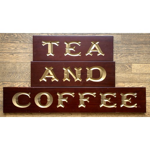 347 - Three mahogany grocer's shop signs, hand carved, gilt decoration, to include Tea, 62cm x 20cm x 2cm,... 