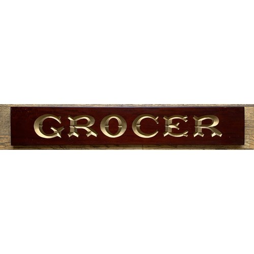 348 - Two mahogany grocer's shop signs, hand carved, gilt decoration, to include Grocers, 123cm x 20cm x 2... 