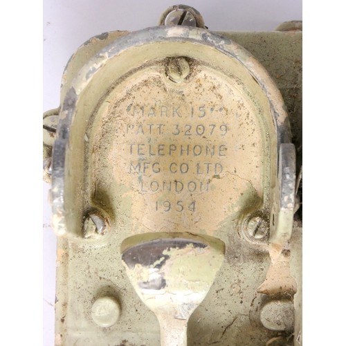 357 - A MFG Co Ltd mark 15 telephone, WWII era Naval telephone, with brass winding handle which gives off ... 