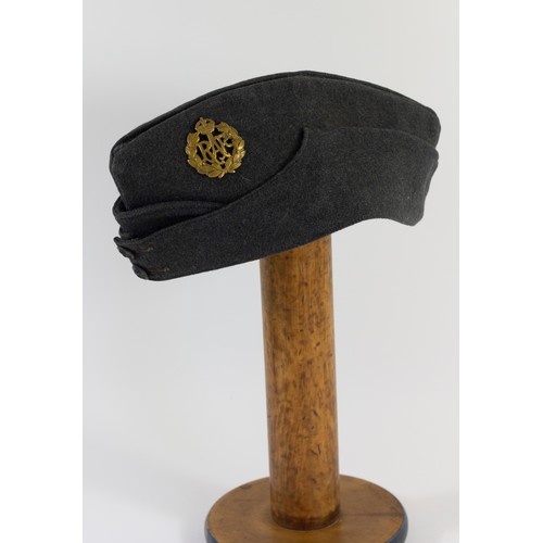 363 - An RAF cap by J. Collett Ltd, dated 1953 size 7 1/8 and a WWII RAF side cap, by J. Collett Ltd, date... 