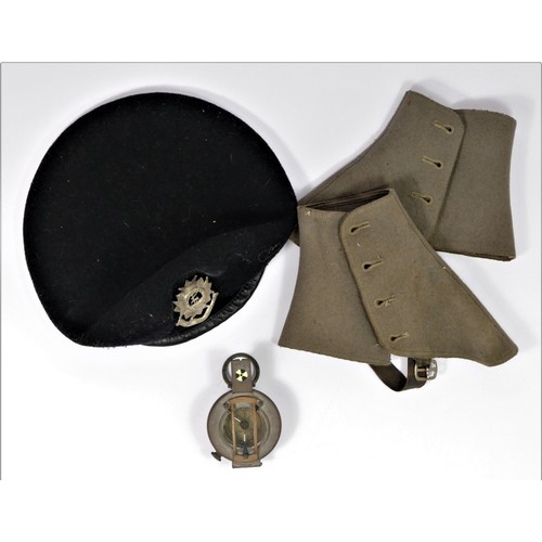 370 - A Stanley, London brass prismatic hand held compass, together with a pair of gaiters and a beret