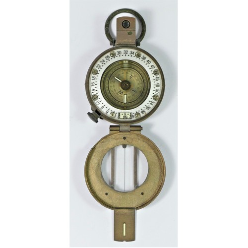 370 - A Stanley, London brass prismatic hand held compass, together with a pair of gaiters and a beret