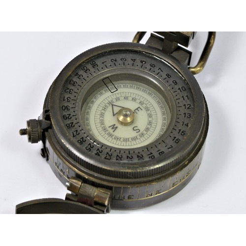 371 - A British Military brass prismatic hand held compass, by Ross, London, broad arrow, together with a ... 