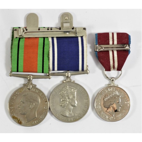 408 - Pair, ER II Police Long Service, awarded to Const. James Grainger and WWII Defense Medal, together w... 