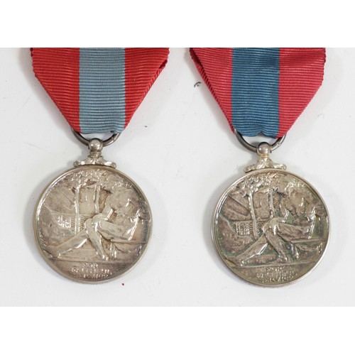 421 - Two family Elizabeth II Imperial Service Medals, named Eric and Wilfred Foster, cased