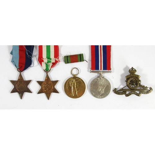 428 - WWII group of three War Medal 1939-1945, Italy Star, 1939-1945 Star, WWI Victory medal, named 975 PT... 