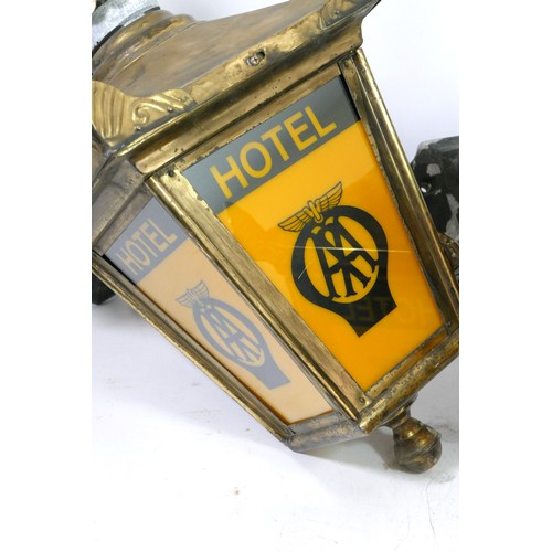 32 - A pair of AA wall hanging lamps, advertising AA hotels, case aluminium brackets, base housing with P... 