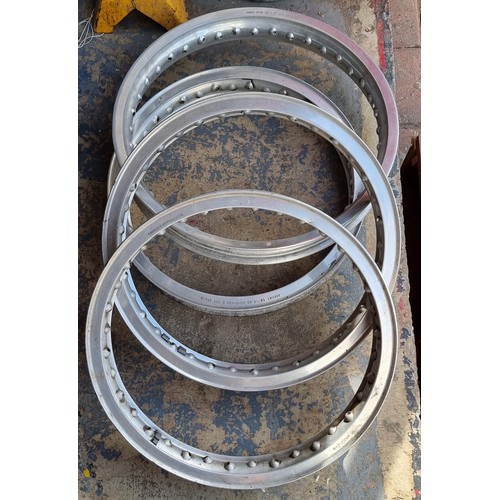 104 - Four alloy rims, Dunlop WM2, 2 x Akront WM2 and Morad WM2