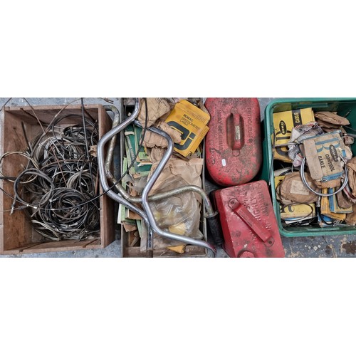 116 - 3 boxes of cables, NOS and used, three handle bars and two petrol cans