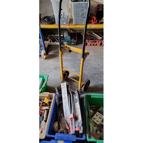 51 - A large quantity of general tools, including hammers, nails and a trolley