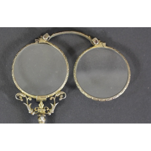 122 - A pair of low grade silver gilt lorgnettes, unmarked, 14cm, case