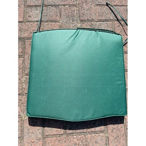 81 - Twelve garden seat cushions, green, foam, approximately 50cm x 50cm, together with four garden bench... 