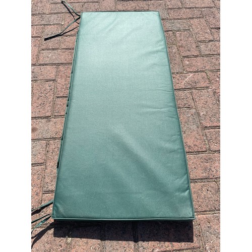 81 - Twelve garden seat cushions, green, foam, approximately 50cm x 50cm, together with four garden bench... 