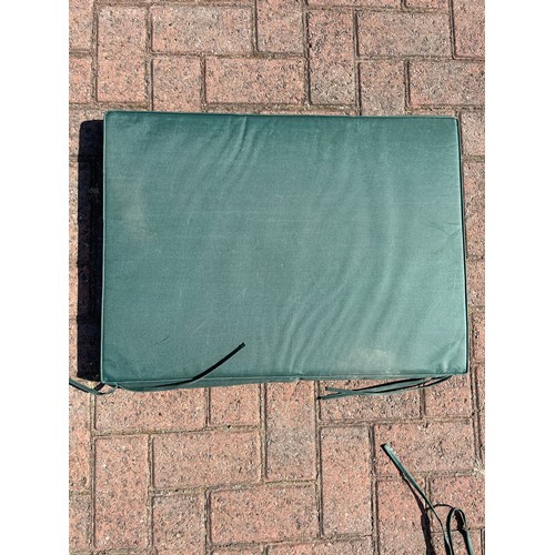 81 - Twelve garden seat cushions, green, foam, approximately 50cm x 50cm, together with four garden bench... 