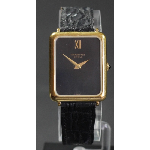 165 - Raymond Wiel, a gilt metal quartz gentleman's wristwatch with black dial, original strap, 26 x 32mm,... 