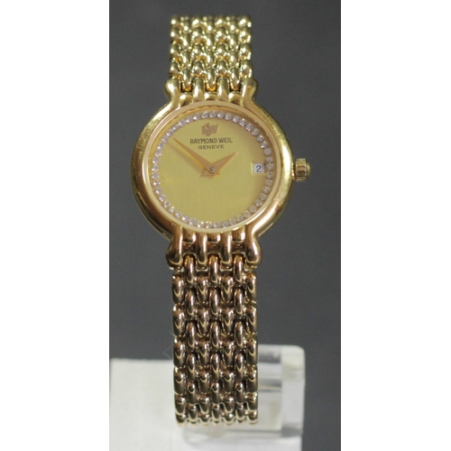 167 - Raymond Weil, a gilt metal date quartz ladies wristwatch, c. 1996, guarantee, spare links, box