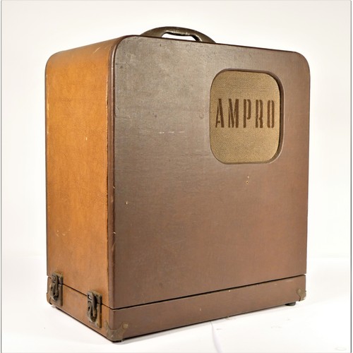 32 - An Ampro film projector (model S4282), with wires and carry case