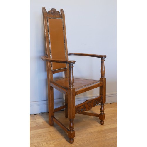 An Arts & Crafts style oak Shakespeare chair, high-backed bow