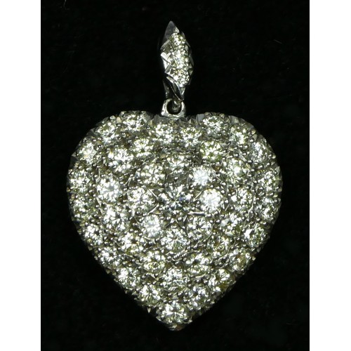 65 - A diamond set heart pendant, pave set with 43 brilliant cut stones, approximate weight 3.40cts, colo... 