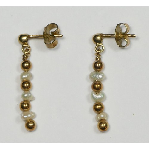 68 - A pair of rice pearl and 9ct gold ear pendants.