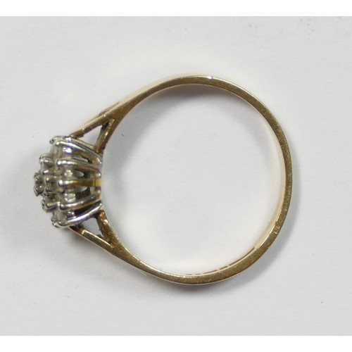 76 - A 9ct gold and diamond cluster ring, claw set with rows of stones, diamond set shoulders, M 1/2, 2.1... 