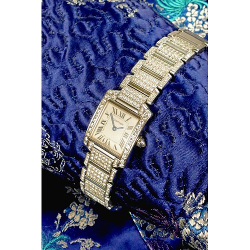 107 - Cartier Tank Francaise, a stainless steel and later diamond set ladies quartz wristwatch, c.2010, re... 