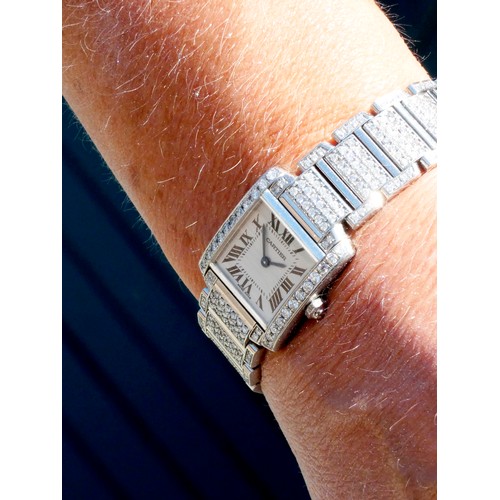 107 - Cartier Tank Francaise, a stainless steel and later diamond set ladies quartz wristwatch, c.2010, re... 