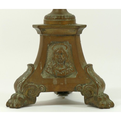 134 - A 19th century church altar pricket candlestick, impressed panels depicting Jesus, Mary and Sacred H... 