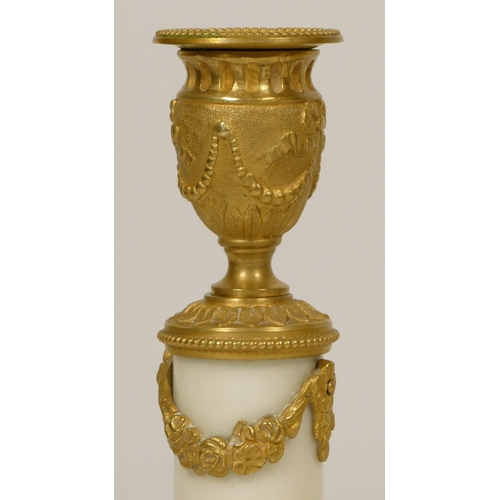 140 - A pair of 19th century style white marble and gilt metal candlesticks, 16cm