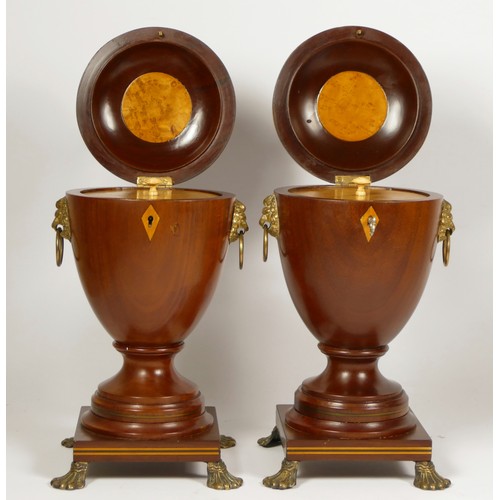 152 - A pair of George III style mahogany vase shape tea caddies, with boxwood and ebony inlay, lion mask ... 