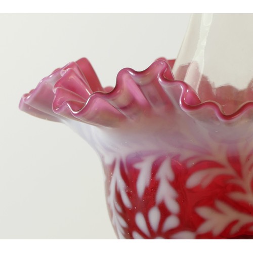 151 - A late Victorian oil lamp, with etched cranberry glass shade, floral decoration, clear glass chimney... 